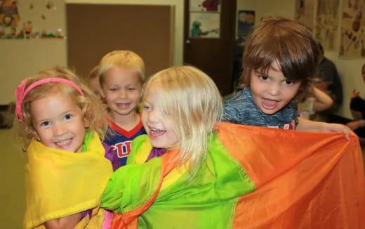 a group of children posing for a photo