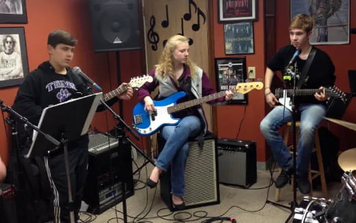 a group of people playing instruments