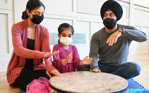 a group of people wearing masks