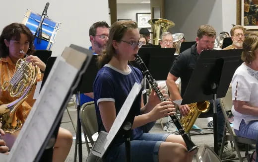 a group of people playing instruments