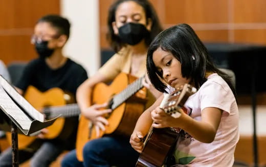 a group of people playing instruments