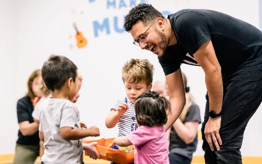 a man and a group of children