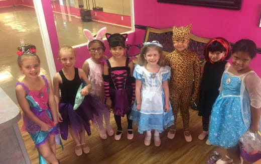 a group of children posing for a photo