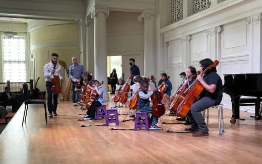 a group of people playing instruments