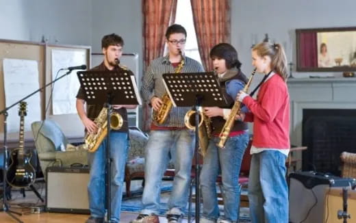 a group of people playing instruments