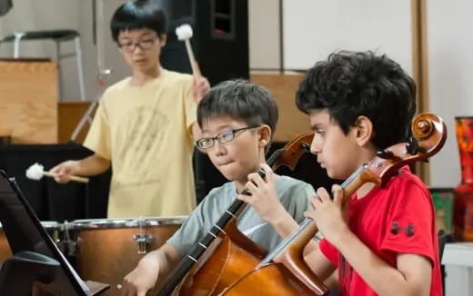 a group of boys playing instruments