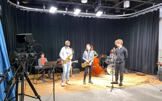 a group of people playing instruments