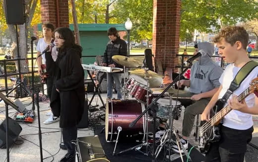 a group of people playing instruments