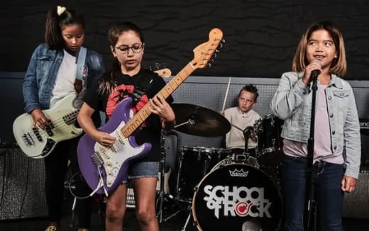 a group of people playing instruments