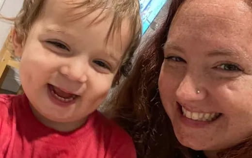 a person and a child smiling