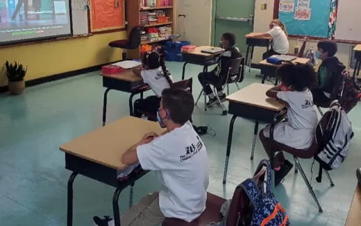 a group of children in a classroom