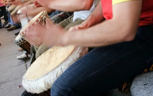 a person holding a large bone