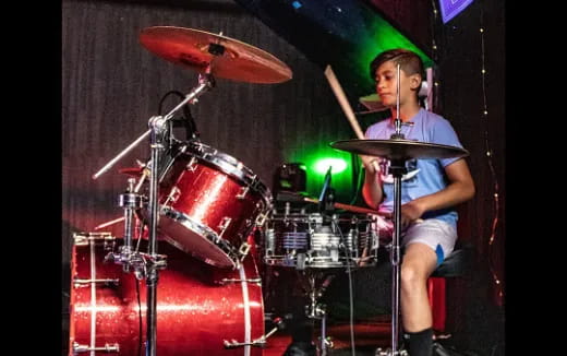 a man playing drums