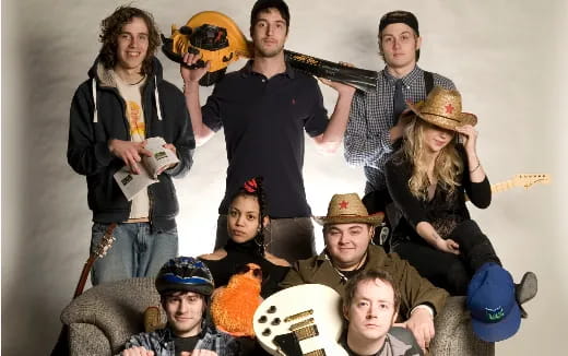 a group of people posing for a photo