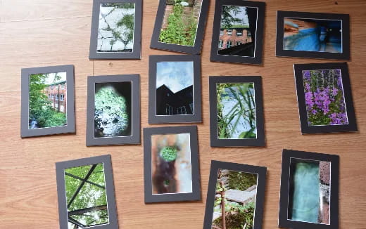 a wall with pictures on it
