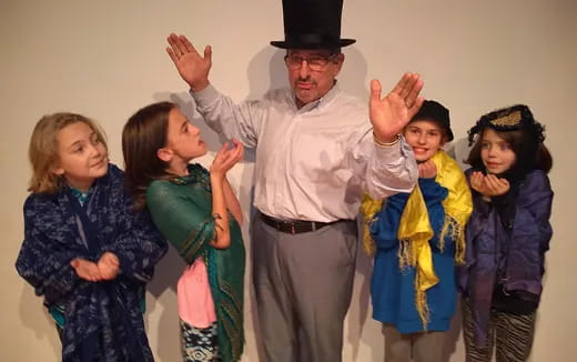 a person in a hat with children