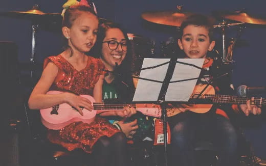 a group of people playing instruments