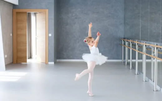 a girl dancing on a stage