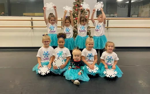 a group of children posing for a photo