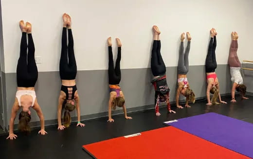 a group of people doing yoga