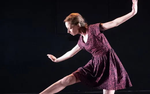 a man dancing on a stage