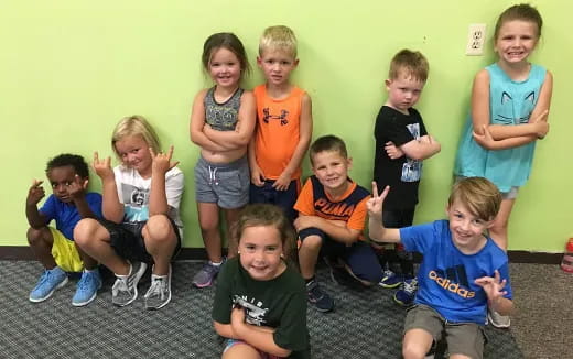 a group of children posing for a photo