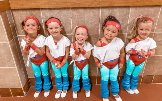 a group of girls in garment