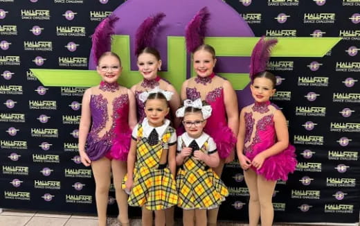 a group of children posing for a photo