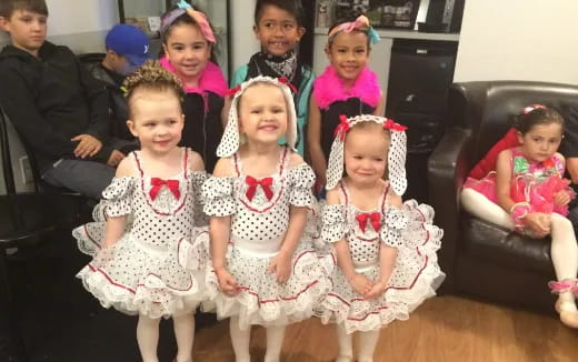 a group of children in clothing