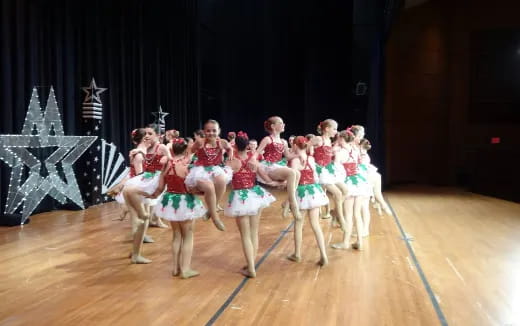 a group of people in clothing on a stage