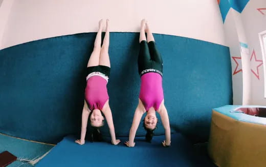 a group of girls doing yoga