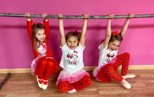 a group of girls posing for a picture