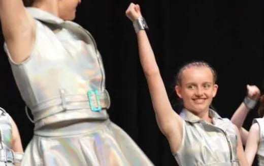 a person holding a person's hand up