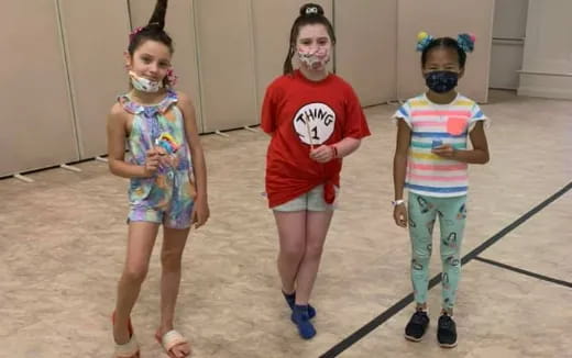 a group of children wearing clothing