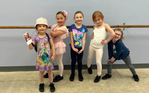 a group of children posing for a photo