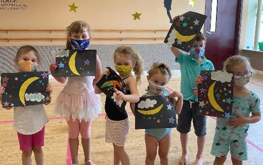 a group of children wearing clothing