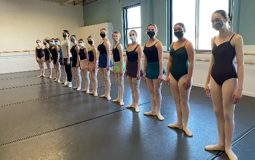 a group of people wearing masks