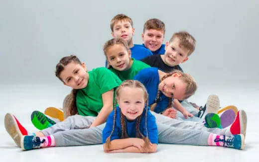 a group of children posing for a photo