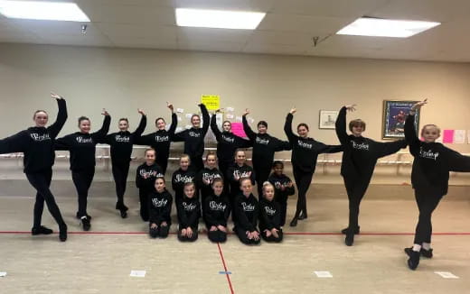 a group of people in black uniforms