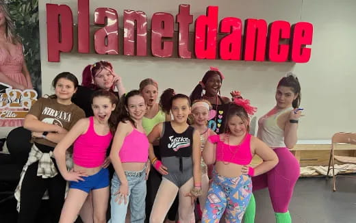 a group of people posing for a photo