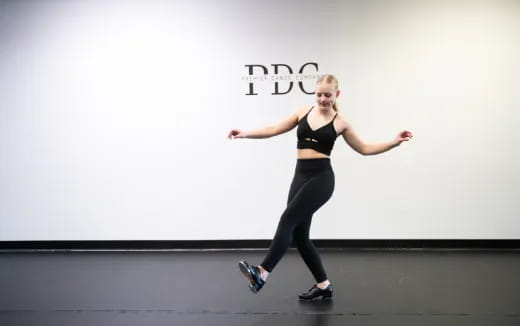 a person dancing on a stage