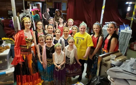 a group of people posing for a photo