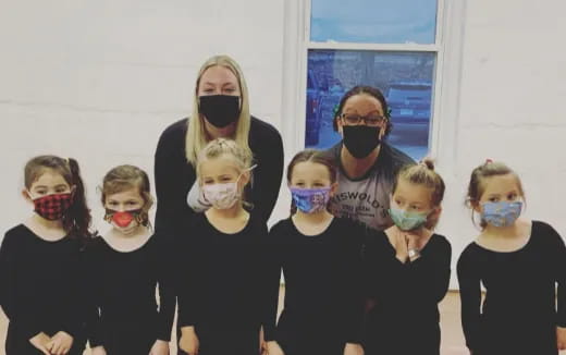 a group of people wearing masks