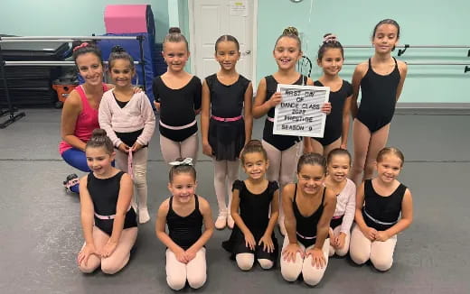 a group of girls posing for a photo