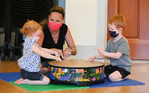 a group of children wearing masks