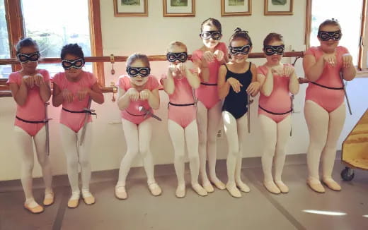 a group of women wearing clothing