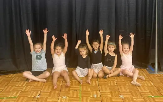 a group of children posing for a photo