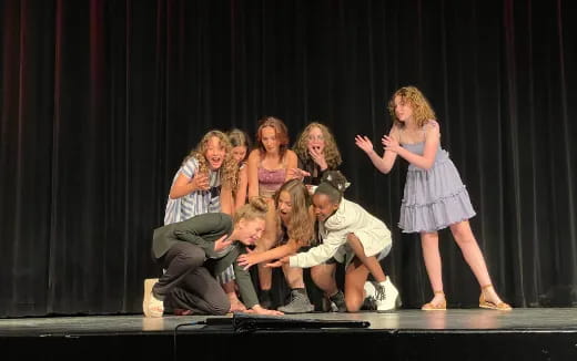 a group of people on a stage