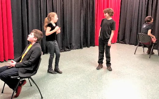 a group of people on a stage
