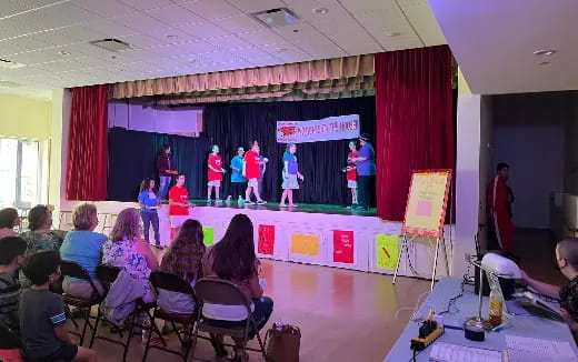 a group of people on stage